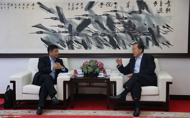 張學(xué)武董事長會見中金公司畢明建總裁（圖）